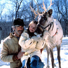 Prancer Sam Elliott Rebecca Harrell pose with Prancer reindeer 12x12 inch photo
