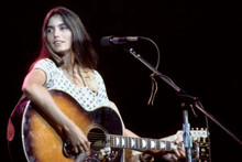 Emmylou Harris 1970's in concert holding guitar looking to side 12x18 poster