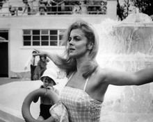 Ann-Margret in bikini by fountain 12x18  Poster