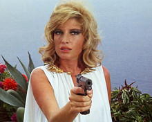 Modesty Blaise Monica Vitti in white dress pointing gun 12x18  Poster