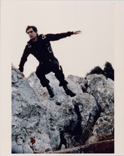 Timohty Dalton jumps from rock as Bond The Living Daylights 8x10 photo 1980's