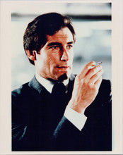 Timohty Dalton 8x10 photo as James Bond smoking cigarette Living Daylights