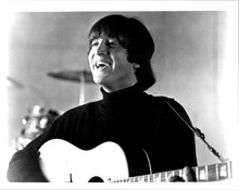 John Lennon vintage 8x10 photograph smiling in black turtle neck playing guitar