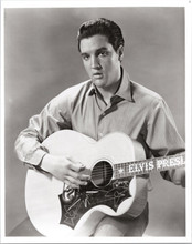 Elvis Presley rare 8x10 photograph holding his Elvis guitar