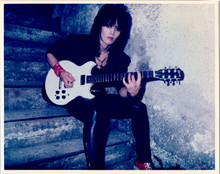 Joan Jett vintage 1970's 8x10 photo seated on steps with guitar