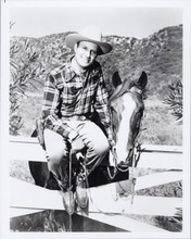 Gene Autry full length pose sitting on fence next to Champion 8x10 photo
