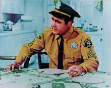 Jonathan Winters sits at table smoking in sheriff uniform 8x10 photo