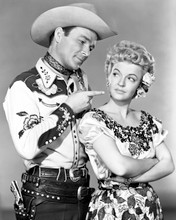 Roy Rogers points at Dale Evans 8x10 photo in western wear