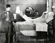 Laurel and Hardy County Hospital Ollie in bed with leg in plaster Stan 8x10