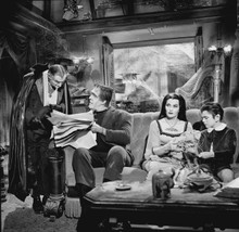 The Munsters Grandpa Herman Lily & Eddie sitting at home together 8x10 photo