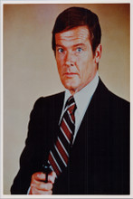 Roger Moore studio portrait as James Bond with gun 8x10 photo Spy Who Loved Me