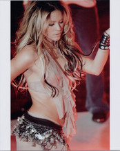 Shakira wears bra top with bare midriff in concert 8x10 press photo
