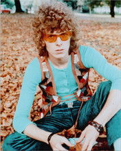 David Bowie classic 1970's pose with glasses sitting in leaves 8x10 photo