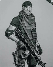 Jason Statham with rare smile holding sub machine gun The Expendables 8x10 photo