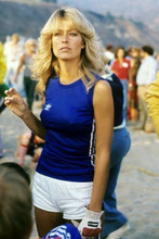 Farrah Fawcett wears blue sleeveless top & white shorts 4x6 inch photo