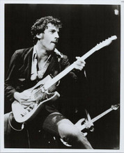Bruce Springsteen in action playing guitar young pose 8x10 photo