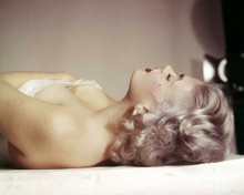 Jayne Mansfield in white bra lying on bed 8x10 photo