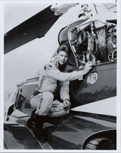 Jan-Michael Vincent poses on side of helicopter Airwolf TV series 8x10 photo
