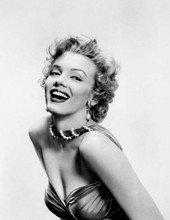 Marilyn Monroe smiling studio glamour pose with cleavage showing 8x10 photo