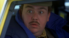 Planes Trains And Automobiles John Candy in cab as Del Griffiths 8x10 photo