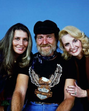Willie Nelson studio portrait with two unidentified women 8x10 photo