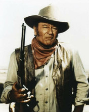 John Wayne The Duke gets tough holding rifle The Undefeated 8x10 inch photo