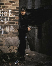 Charles Bronson holding huge gun by street corner Death Wish 3 8x10 inch photo