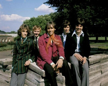 The Bee Gees rare 1960's pose of the five Gibb brothers by wall 8x10 inch photo