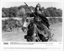 Joanne Whalley on horseback aiming bow and arrow 8x10 photo Willow