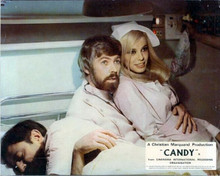 Candy 1968 movie James Coburn holds Ewa Aulin dressed as nurse 8x10 inch photo