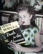 Debbie Reynolds reading Ernest Hemingway novel 1950's 8x10 inch photo