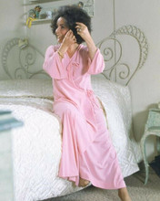 Elizabeth Taylor sits on bed wearing pink nightgown 1972 Zee and Co 8x10 photo