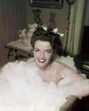 Jane Russell smiling pose sitting in bubble bath 8x10 inch photo