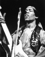 Jimi Hendrix classic in concert playing his guitar & singing 8x10 inch photo
