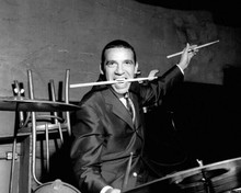 Buddy Rich great pose at his drums with drumstick in mouth 8x10 inch photo