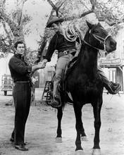 Cheyenne TV series Clint Walker shakes hands with Will Hutchins on horse 8x10