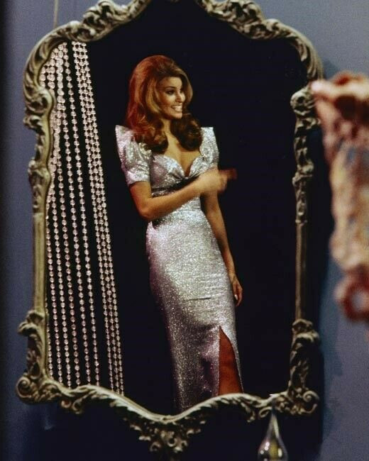 raquel welch silver dress Raquel Welch 1968 pose in clingy silver gown looks in mirror 8x10 inch  photo