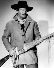 John Wayne as Ethan Edwards holding his rifle The Searchers 8x10 inch photo