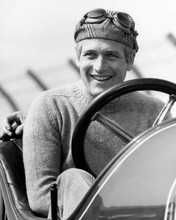 Paul Newman smiles whilst posing in vintage car wearing cap & goggles 8x10 photo