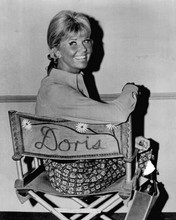 Doris Day sits on her studio chair smiling The Doris Day Show 8x10 inch photo