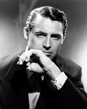 Cary Grant cool and debonair in tuxedo smoking cigarette 8x10 inch photo