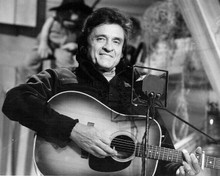 Johnny Cash guest stars on The Muppet Show in 1980 with his guitar 8x10 photo