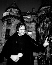Johnny Cash poses outside castle 1981 Johnny Cash Christmas in Scotland 8x10