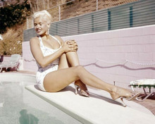 Jayne Mansfield sits on her diving board at her home pool 8x10 inch photo
