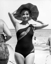 Claudine Auger wears classic Thunderball swimsuit on beach 8x10 inch photo