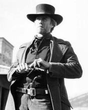 Clint Eastwood reloads his pistol during shootout Pale Rider 8x10 inch photo