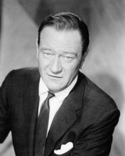 John Wayne The Duke looks suave in suit in this 1961 studio portrait 8x10 photo