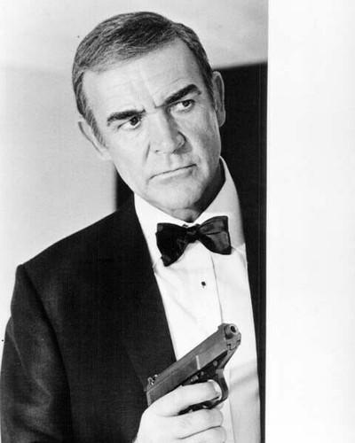 Sean Connery as Bond holding gun by open door Never Say Never Again ...