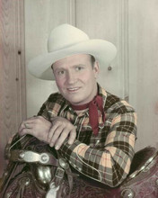 Gene Autry the Singing Cowboy 1940's portrait with his saddle 8x10 inch photo