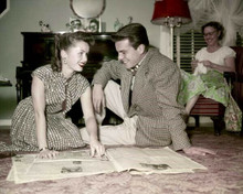 Robert Wagner 1950's looks at newspaper with unidentified girl 8x10 inch photo